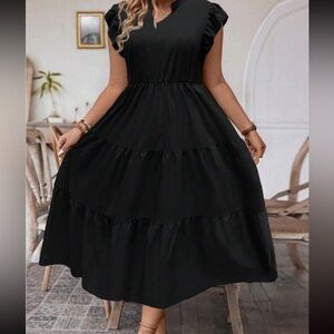 Ruffled sleeved dress